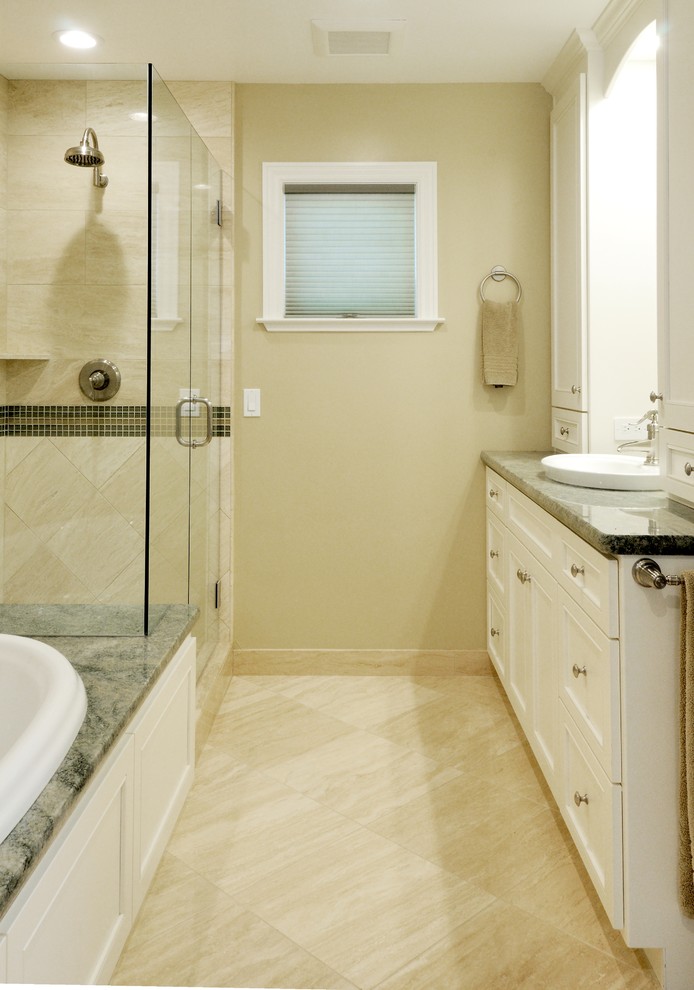 Photo of a medium sized classic ensuite bathroom in Sacramento with a built-in sink, recessed-panel cabinets, white cabinets, granite worktops, a built-in bath, a corner shower, white tiles, stone tiles, beige walls and travertine flooring.