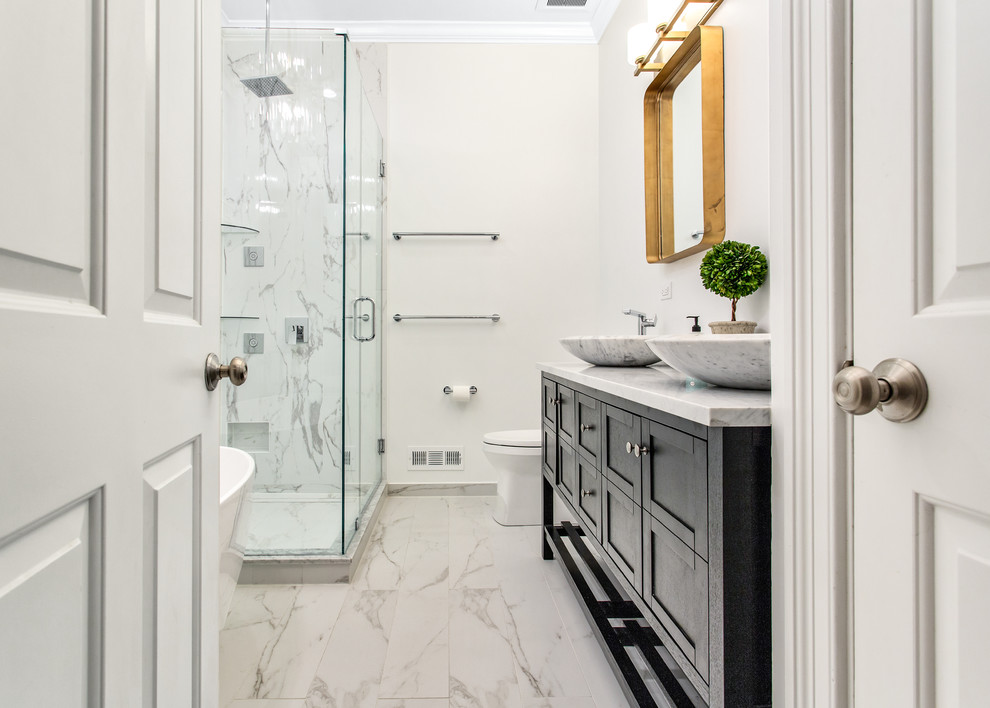 Inspiration for a mid-sized contemporary master white tile and mosaic tile marble floor and white floor bathroom remodel in Chicago with shaker cabinets, black cabinets, a one-piece toilet, white walls, a drop-in sink, quartz countertops, a hinged shower door and white countertops