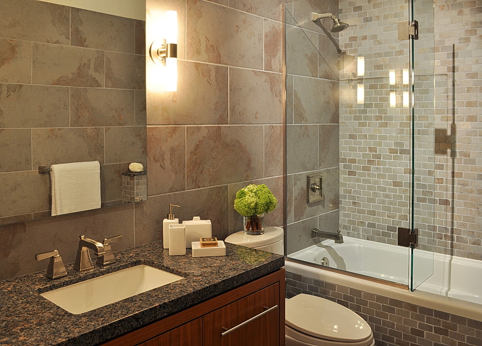 Example of a trendy bathroom design in Vancouver with granite countertops