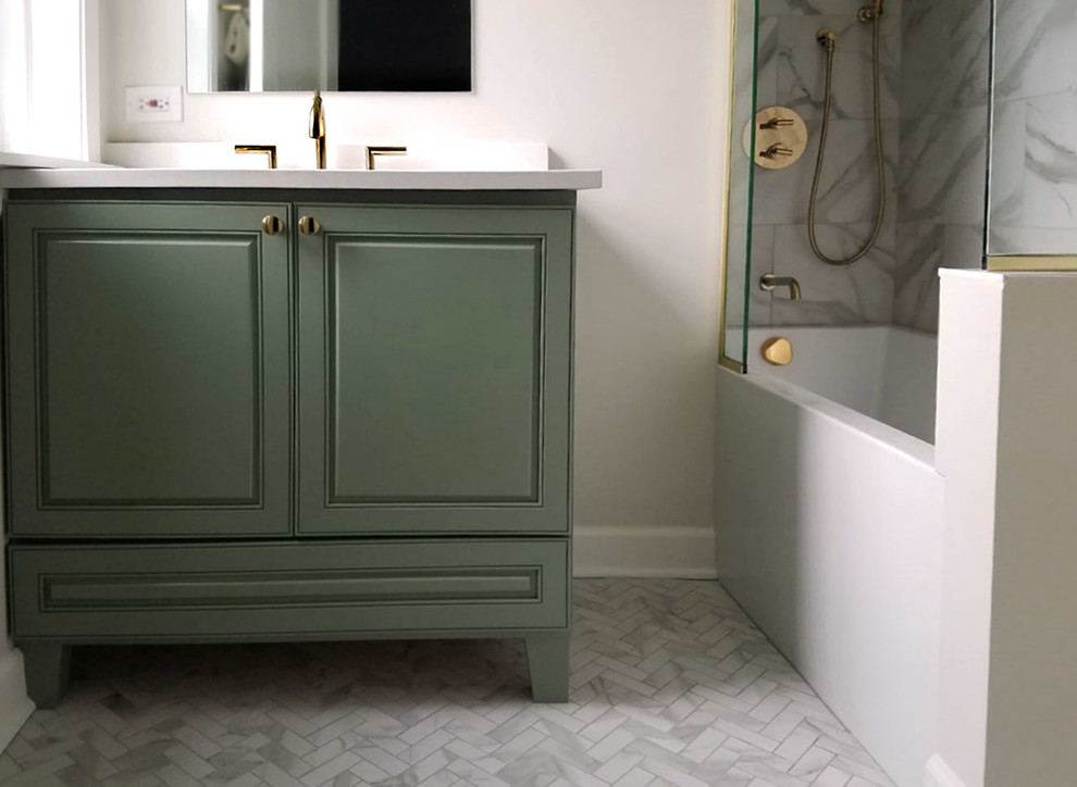 Mid-sized minimalist master white tile and porcelain tile porcelain tile and white floor bathroom photo in Chicago with raised-panel cabinets, green cabinets, a two-piece toilet, beige walls, an undermount sink, quartz countertops and white countertops