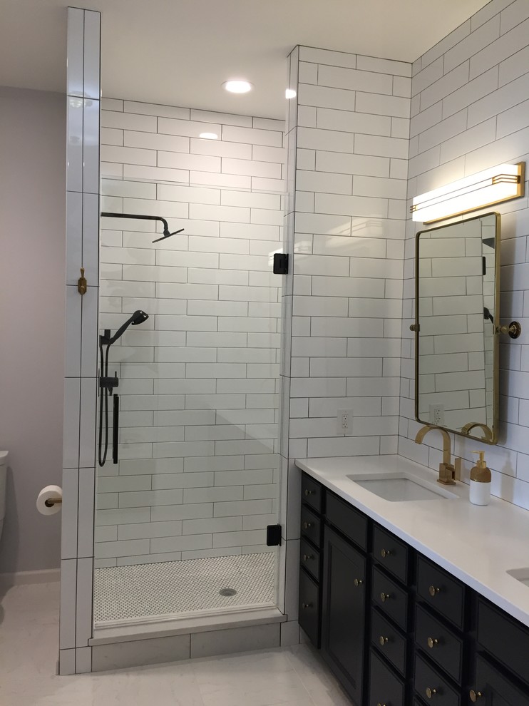 Double shower - mid-sized transitional master white tile and ceramic tile ceramic tile double shower idea in Cincinnati with beaded inset cabinets, black cabinets, a two-piece toilet, gray walls, a drop-in sink and quartz countertops