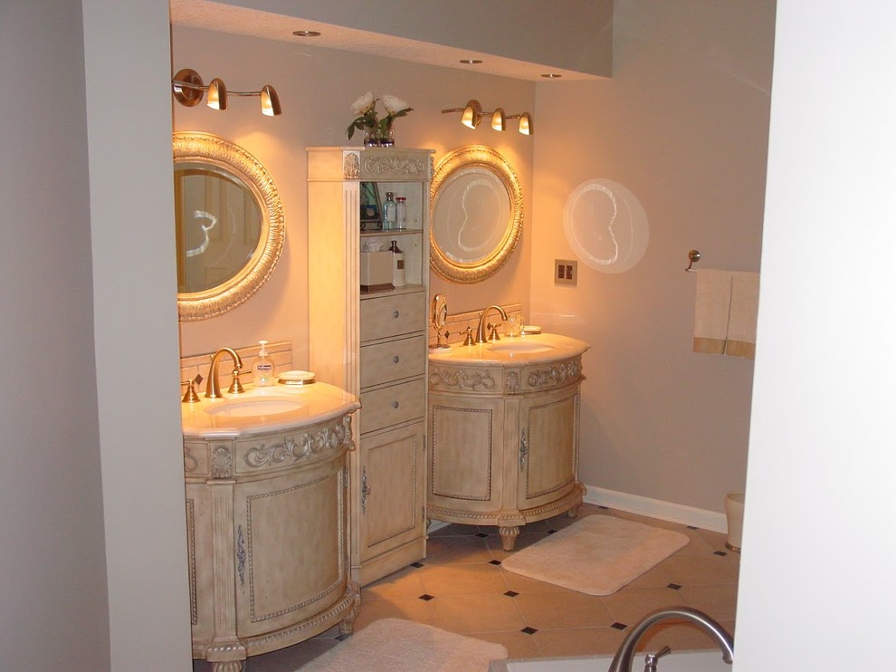 Inspiration for a small victorian ensuite bathroom in Kansas City with freestanding cabinets, distressed cabinets, porcelain flooring and marble worktops.