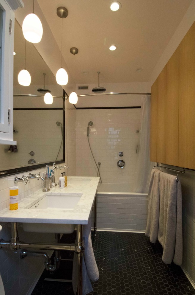 Medium sized midcentury ensuite bathroom in New York with a submerged sink, flat-panel cabinets, light wood cabinets, marble worktops, a built-in bath, a walk-in shower, a one-piece toilet, white tiles, ceramic tiles, white walls and ceramic flooring.