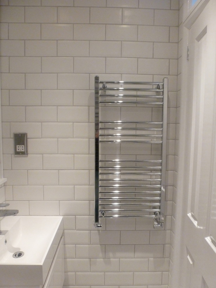 Bathroom - small industrial master bathroom idea in London