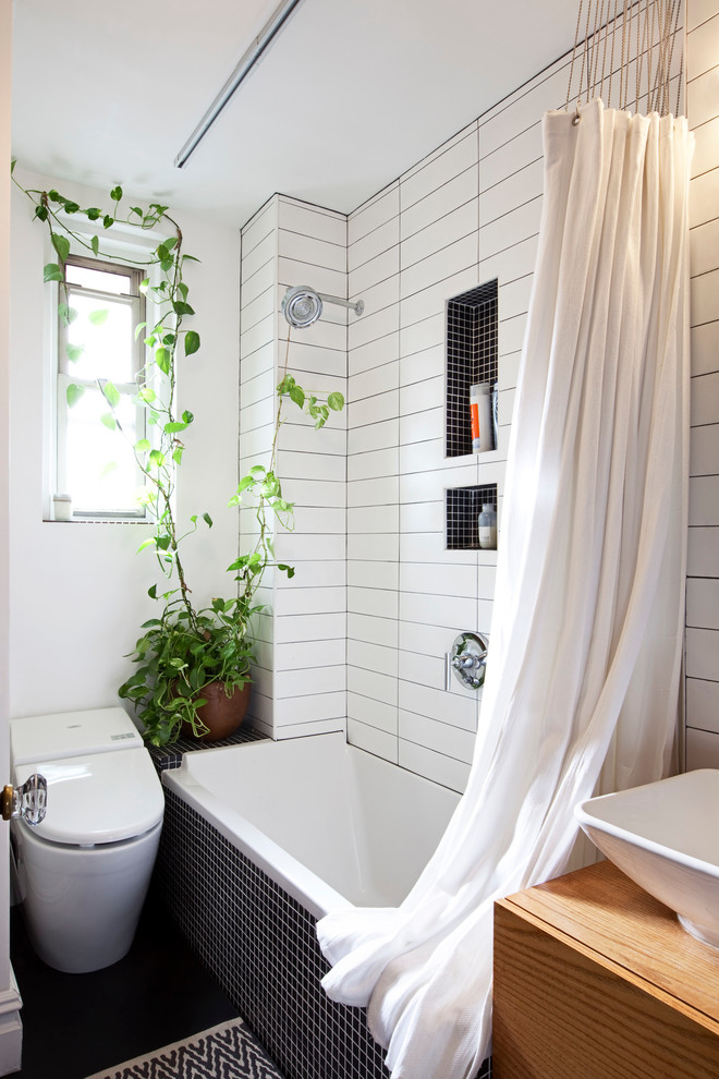 Small trendy master white tile and ceramic tile bathroom photo in New York with white walls, a one-piece toilet and a vessel sink