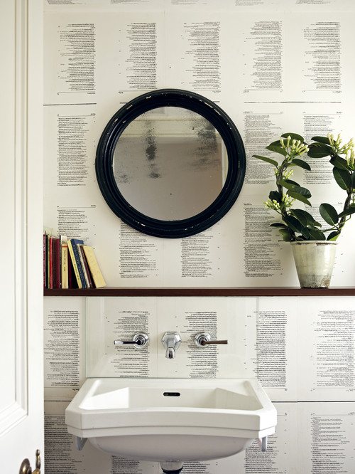 Eclectic Charm: Bathroom with Book Pages as a Unique Wallpaper