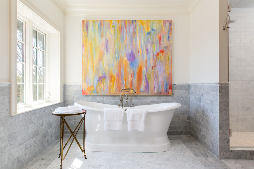 Inspiration for a mid-sized cottage master gray tile, white tile and marble tile marble floor and white floor bathroom remodel in Birmingham with white cabinets, a two-piece toilet, white walls, a pedestal sink, marble countertops, a hinged shower door and white countertops