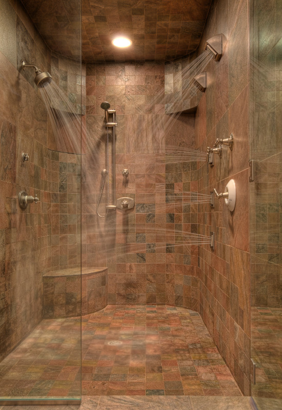 Double shower - mid-sized modern master porcelain tile and beige tile porcelain tile and brown floor double shower idea in Other with multicolored walls and a hinged shower door