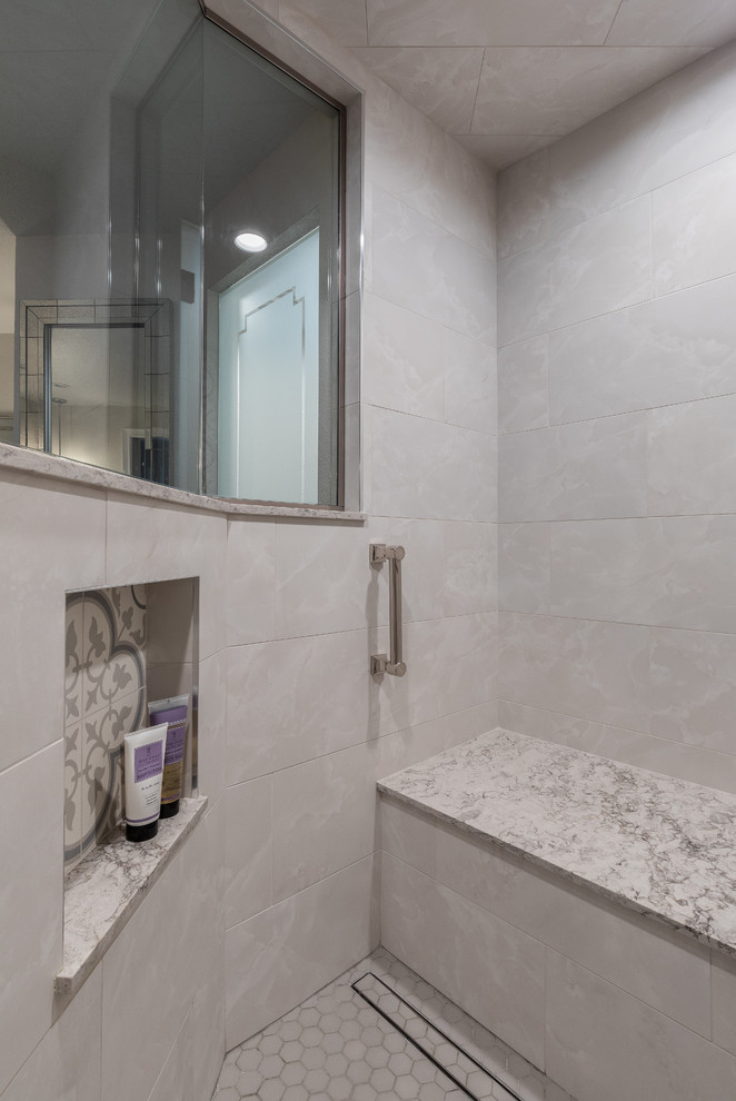 Example of a large farmhouse master white tile and porcelain tile ceramic tile and gray floor double shower design in Denver with furniture-like cabinets, distressed cabinets, a two-piece toilet, beige walls, a drop-in sink, quartz countertops, a hinged shower door and multicolored countertops