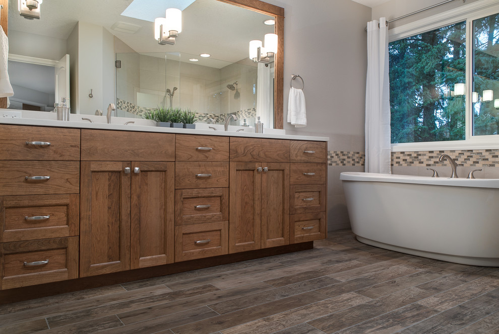 Inspiration for a traditional ensuite bathroom in Portland with a freestanding bath, a walk-in shower, a one-piece toilet, grey walls and ceramic flooring.