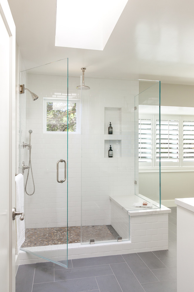 Design ideas for a large classic ensuite bathroom in San Francisco with shaker cabinets, white cabinets, white tiles, quartz worktops, white worktops, a corner shower, beige walls, plywood flooring, a submerged sink, grey floors and a hinged door.