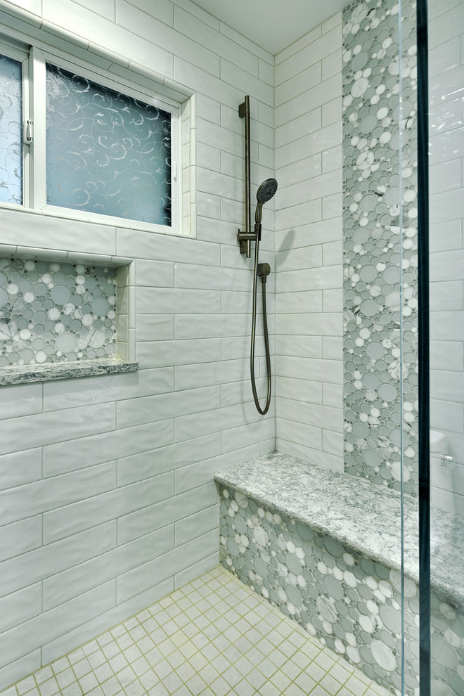Alcove shower - mid-sized contemporary kids' white tile and ceramic tile porcelain tile and white floor alcove shower idea in San Francisco with recessed-panel cabinets, white cabinets, a one-piece toilet, blue walls, a vessel sink, quartz countertops, a hinged shower door and turquoise countertops
