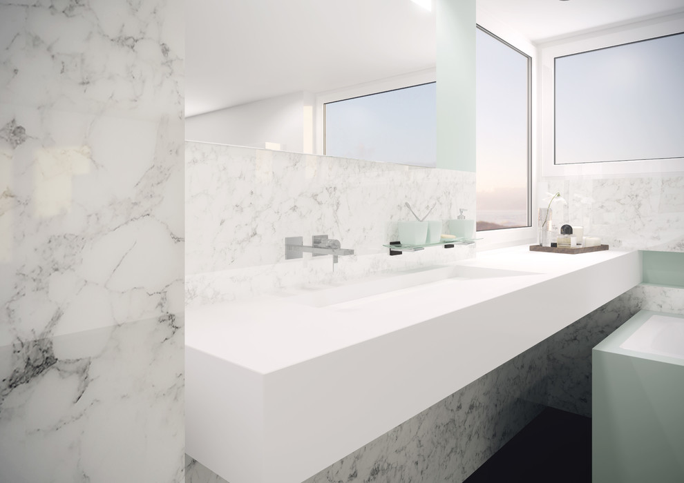 Inspiration for a contemporary bathroom in Other with marble tiles and multi-coloured walls.