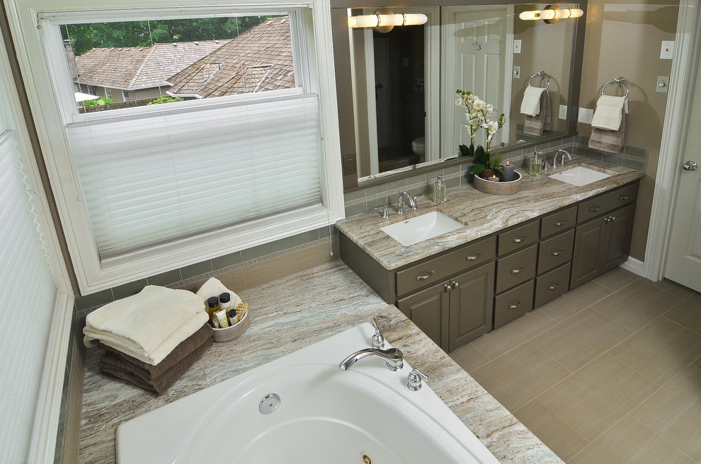 Example of a transitional master beige tile and porcelain tile porcelain tile bathroom design in Portland with an undermount sink, raised-panel cabinets, gray cabinets, marble countertops and beige walls