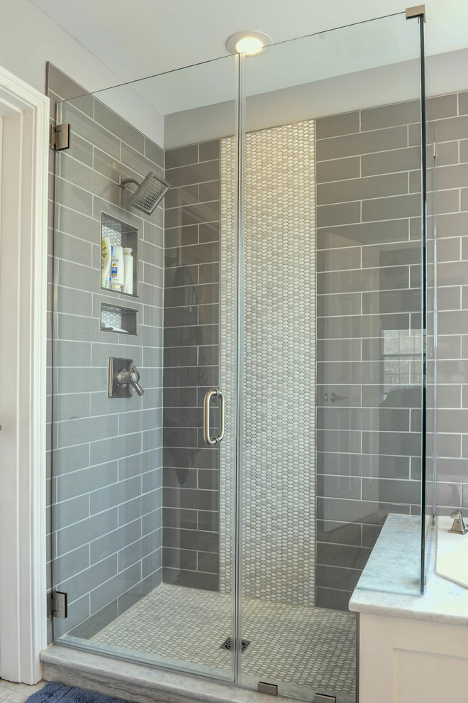 Example of a mid-sized minimalist master bathroom design in Louisville with gray walls, a hinged shower door, recessed-panel cabinets, gray cabinets, a two-piece toilet, an undermount sink, marble countertops and white countertops