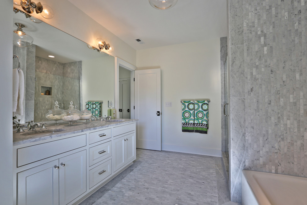 Example of a large transitional master multicolored tile and stone tile marble floor bathroom design in Portland with an undermount sink, shaker cabinets, white cabinets, marble countertops, a wall-mount toilet and white walls