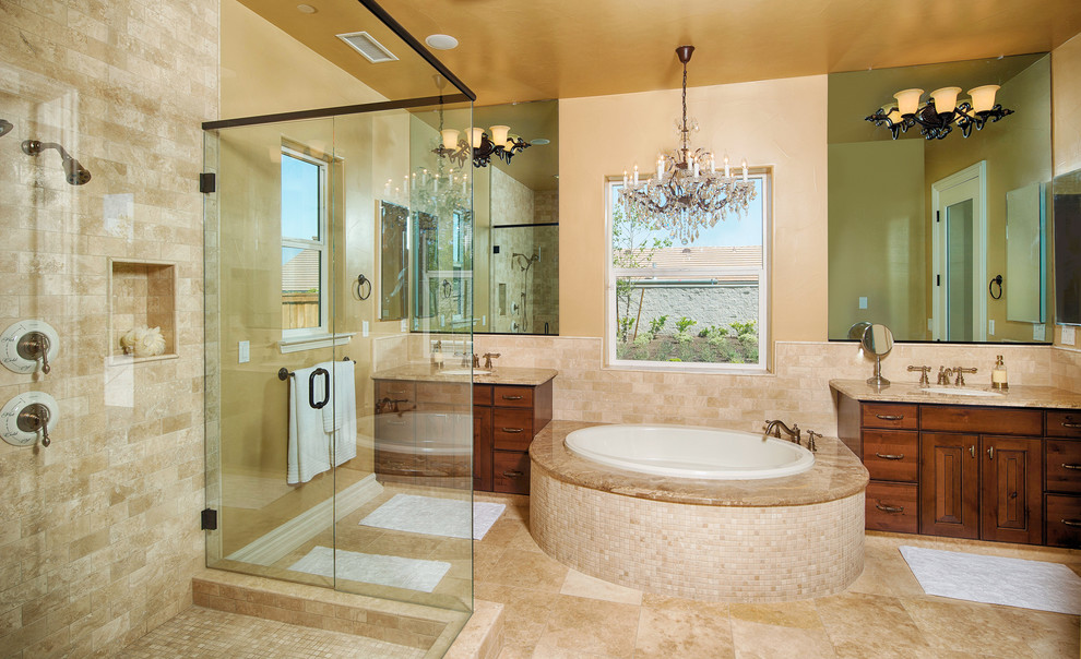 This is an example of a large traditional bathroom in San Francisco with a built-in sink, raised-panel cabinets, medium wood cabinets, granite worktops, a hot tub, a corner shower, beige tiles, ceramic tiles, beige walls, ceramic flooring, beige floors and a hinged door.