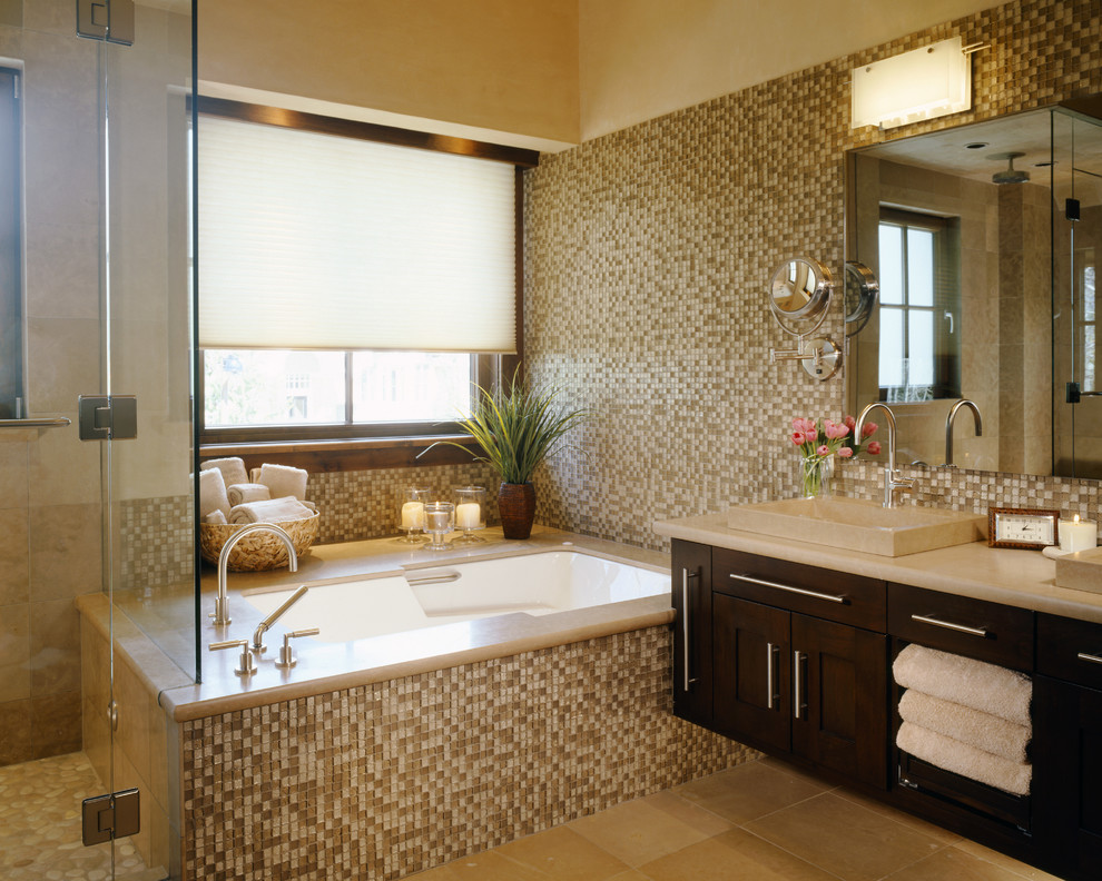 Imagen de cuarto de baño contemporáneo con lavabo sobreencimera, puertas de armario de madera en tonos medios, bañera encastrada sin remate, baldosas y/o azulejos marrones, baldosas y/o azulejos en mosaico y ventanas