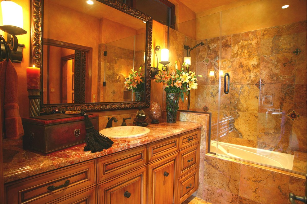 Свежая идея для дизайна: ванная комната в средиземноморском стиле с накладной раковиной и душем над ванной - отличное фото интерьера