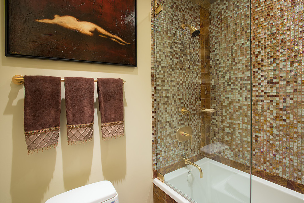 Mid-sized tuscan 3/4 beige tile, brown tile, multicolored tile, white tile and mosaic tile ceramic tile bathroom photo in Los Angeles with flat-panel cabinets, medium tone wood cabinets, brown walls, granite countertops and a two-piece toilet