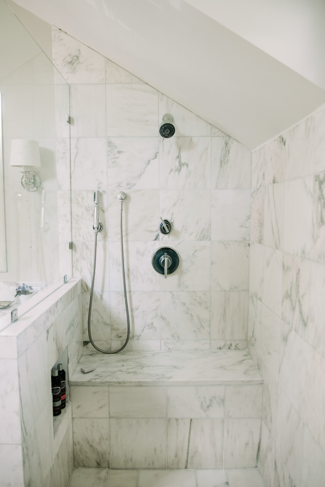 Design ideas for a medium sized classic ensuite bathroom in Birmingham with flat-panel cabinets, white cabinets, a freestanding bath, a double shower, white tiles, stone tiles, medium hardwood flooring, a submerged sink and marble worktops.