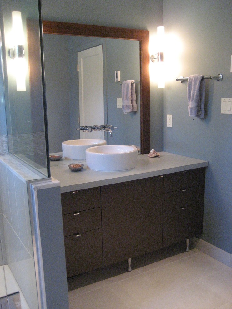 Example of a small 1950s gray tile and ceramic tile ceramic tile alcove shower design in Vancouver with a vessel sink, flat-panel cabinets, dark wood cabinets, laminate countertops, a one-piece toilet and blue walls
