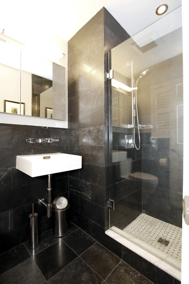 Inspiration for a small modern bathroom in Other with black tiles, stone tiles and marble flooring.