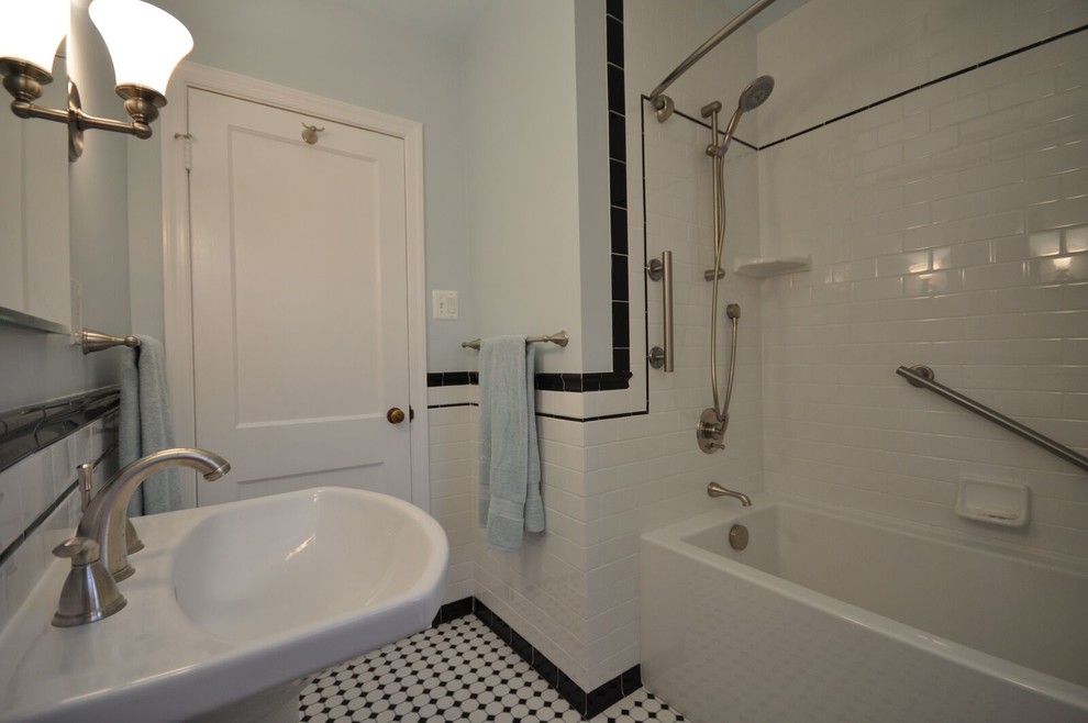 Mid-sized elegant 3/4 black and white tile and subway tile ceramic tile bathroom photo in DC Metro with a two-piece toilet, blue walls and a pedestal sink