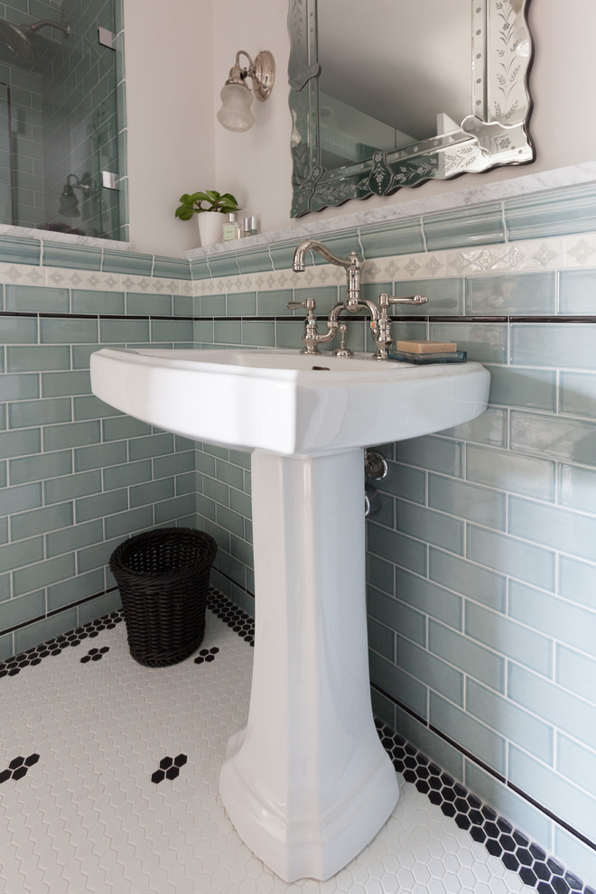 Design ideas for a small classic shower room bathroom in Seattle with an alcove shower, a two-piece toilet, blue tiles, white walls, porcelain flooring, a pedestal sink, white floors and a hinged door.