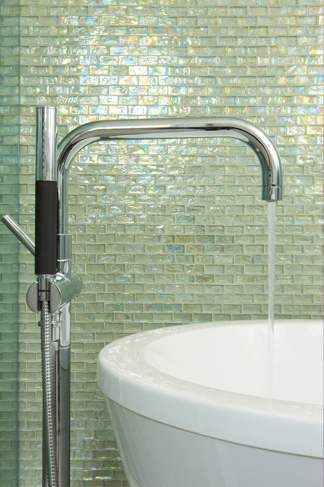 Design ideas for a beach style bathroom in Boston with a freestanding bath and glass tiles.