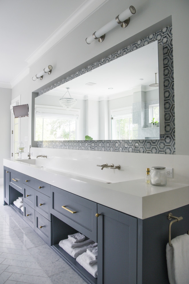Example of a transitional master gray tile and white tile gray floor and double-sink bathroom design in Houston with recessed-panel cabinets, gray cabinets, an integrated sink, white countertops and a built-in vanity