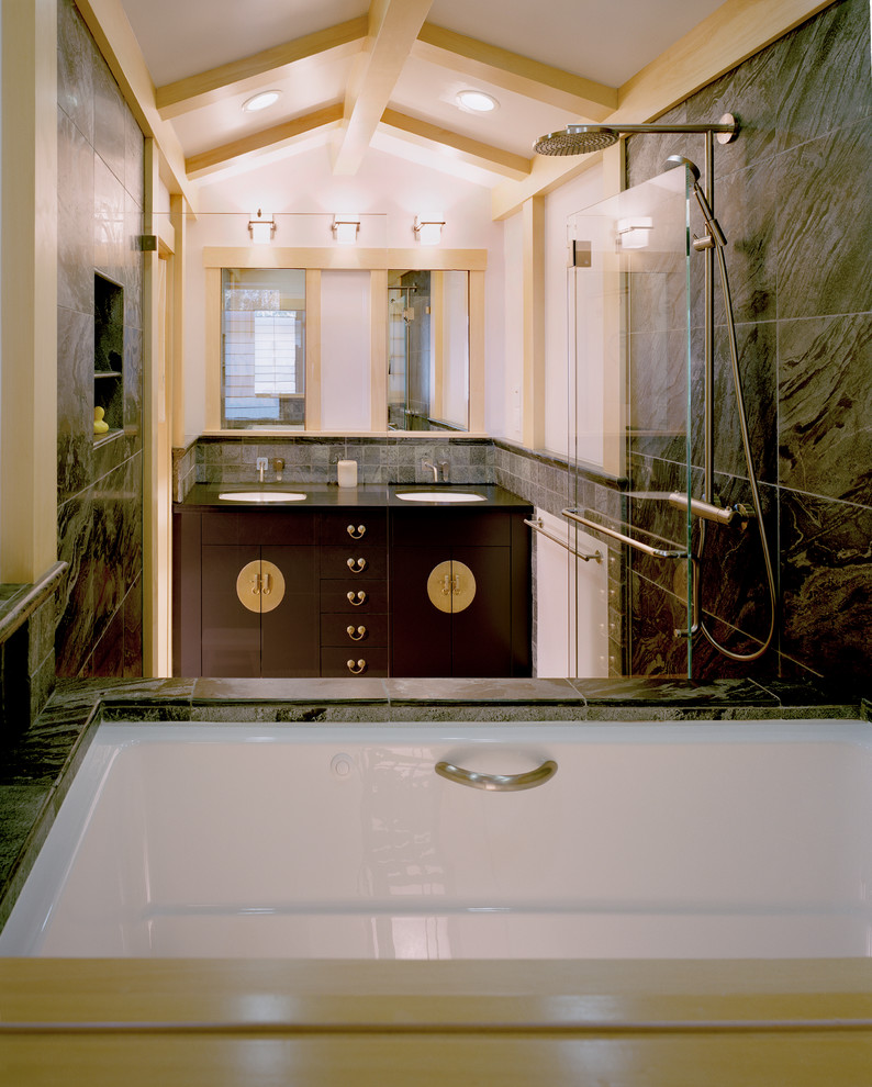 Example of a mid-sized zen master green tile and stone tile porcelain tile doorless shower design in San Francisco with an undermount sink, flat-panel cabinets, dark wood cabinets, granite countertops, an undermount tub, a two-piece toilet and white walls