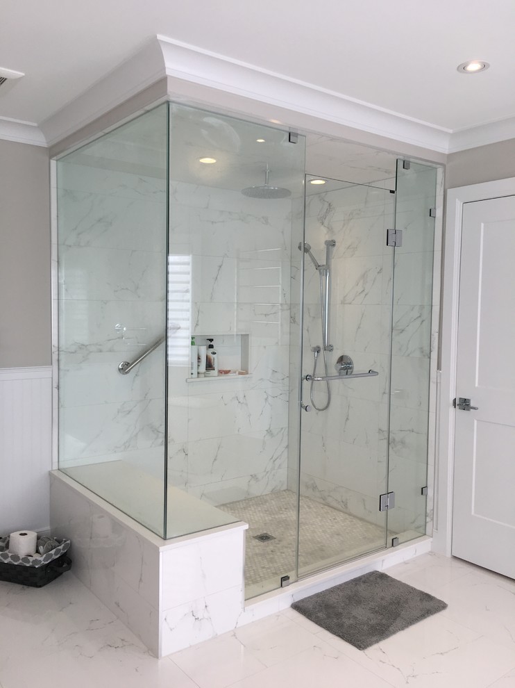 Example of a huge transitional master white tile and porcelain tile porcelain tile and white floor bathroom design in Toronto with recessed-panel cabinets, gray cabinets, a two-piece toilet, gray walls, an undermount sink, quartz countertops, a hinged shower door and white countertops