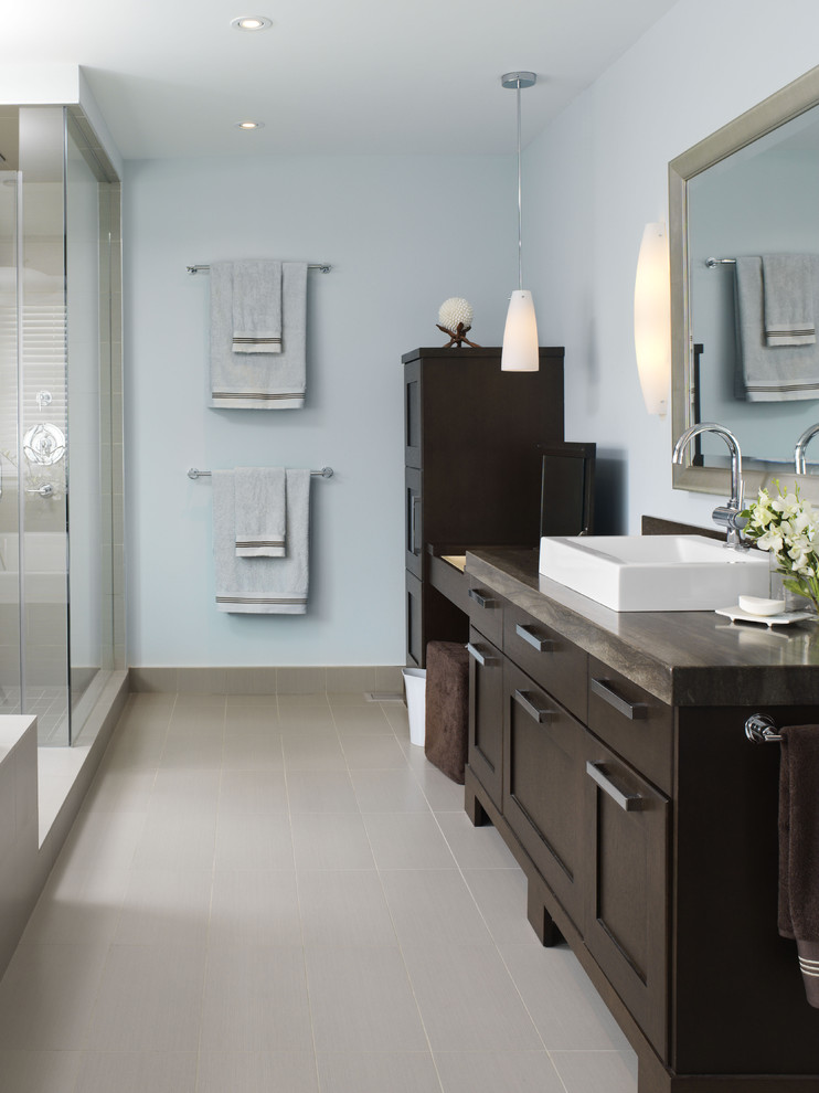 Design ideas for a traditional bathroom in Toronto with a console sink, shaker cabinets, dark wood cabinets, marble worktops, a built-in bath, a two-piece toilet, grey tiles, porcelain tiles, green walls and porcelain flooring.