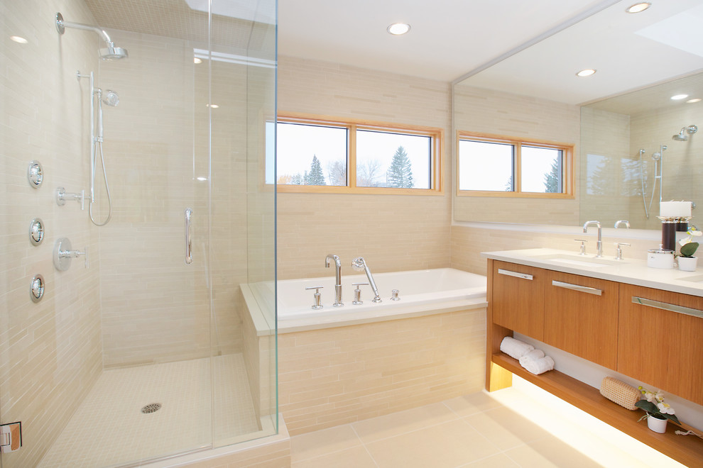 Inspiration for a contemporary bathroom in Calgary with medium wood cabinets and beige floors.