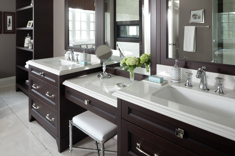 Photo of a large classic ensuite bathroom in New York with recessed-panel cabinets, dark wood cabinets, a freestanding bath, a corner shower, a two-piece toilet, brown walls, porcelain flooring, a submerged sink and quartz worktops.