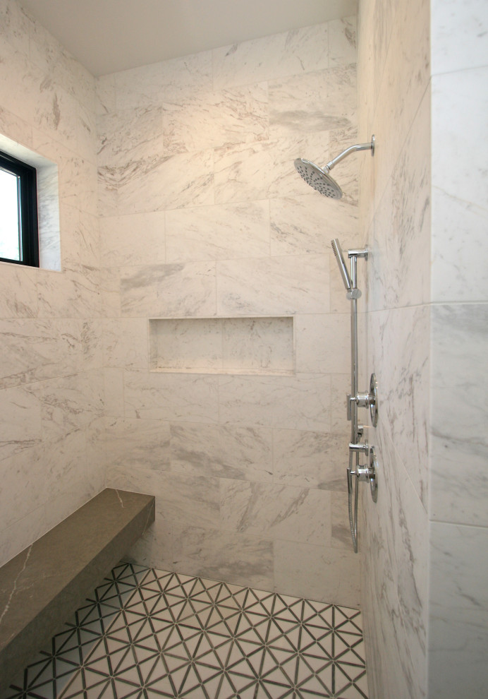 Large transitional master white tile and marble tile mosaic tile floor, gray floor and double-sink bathroom photo in Seattle with recessed-panel cabinets, light wood cabinets, a two-piece toilet, white walls, an undermount sink, marble countertops, gray countertops and a freestanding vanity