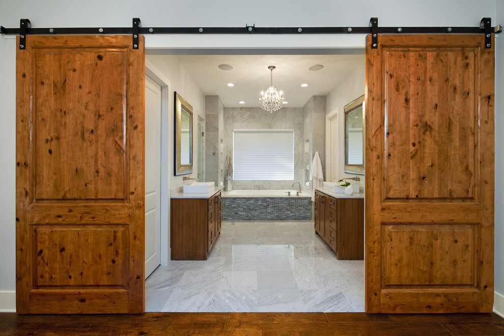 Photo of a contemporary bathroom in Austin with mosaic tiles.
