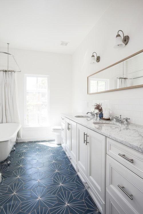 Timeless Style: White Farmhouse Bathroom with Navy-Blue Floor Tiles