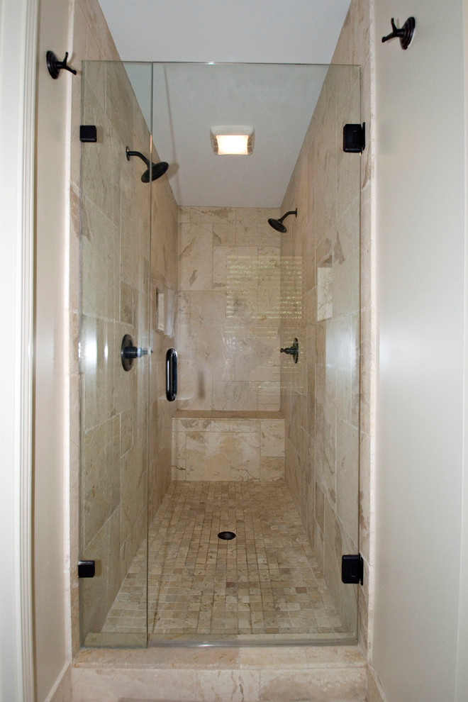 Mid-sized elegant master beige tile and stone tile travertine floor alcove shower photo in Atlanta with an undermount sink, furniture-like cabinets, black cabinets, granite countertops, a two-piece toilet and beige walls
