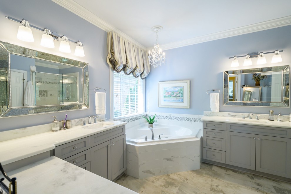 Example of a large classic master bathroom design in Raleigh with blue walls, an undermount sink, shaker cabinets, gray cabinets, quartzite countertops, a hinged shower door and a two-piece toilet