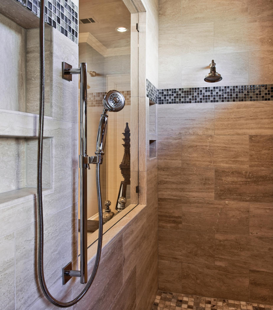 This is an example of a traditional bathroom in Dallas with a double shower, beige tiles, travertine tiles, beige walls, mosaic tile flooring, multi-coloured floors and a hinged door.