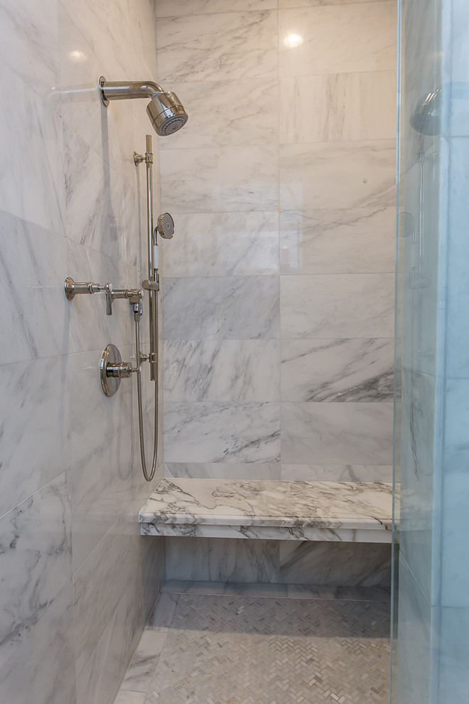 Inspiration for a large classic ensuite bathroom in Houston with beaded cabinets, blue cabinets, a freestanding bath, an alcove shower, a bidet, white tiles, stone tiles, grey walls, marble flooring, a submerged sink and marble worktops.