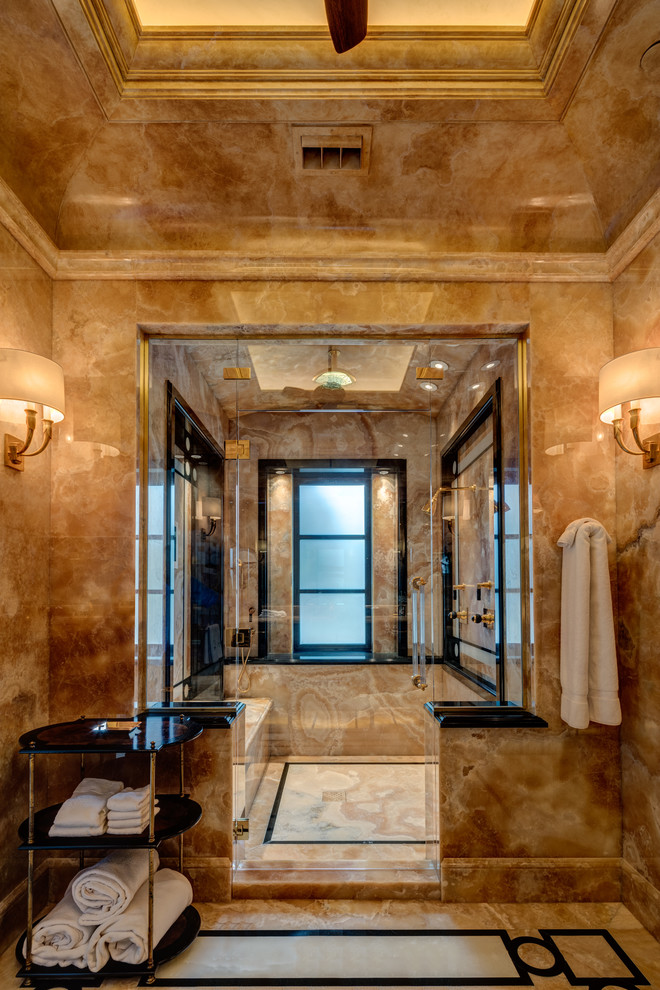 Cette photo montre une très grande salle de bain principale chic avec une douche double, du carrelage en marbre, un sol en carrelage de terre cuite, un sol multicolore, une cabine de douche à porte battante et un carrelage marron.