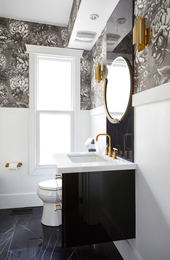 Inspiration for a classic bathroom in Toronto with flat-panel cabinets, black cabinets, grey walls, a submerged sink, black floors, white worktops, a single sink, a floating vanity unit, wainscoting and wallpapered walls.