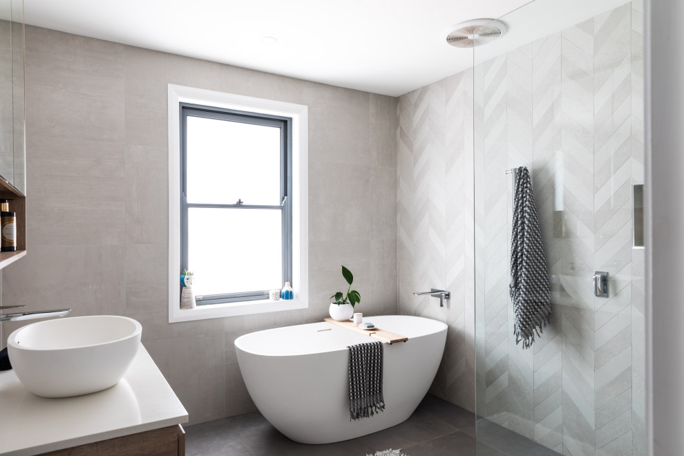Inspiration for a large contemporary family bathroom in Sydney with flat-panel cabinets, light wood cabinets, a vessel sink, engineered stone worktops, an open shower, white worktops, a wall niche, double sinks and a floating vanity unit.