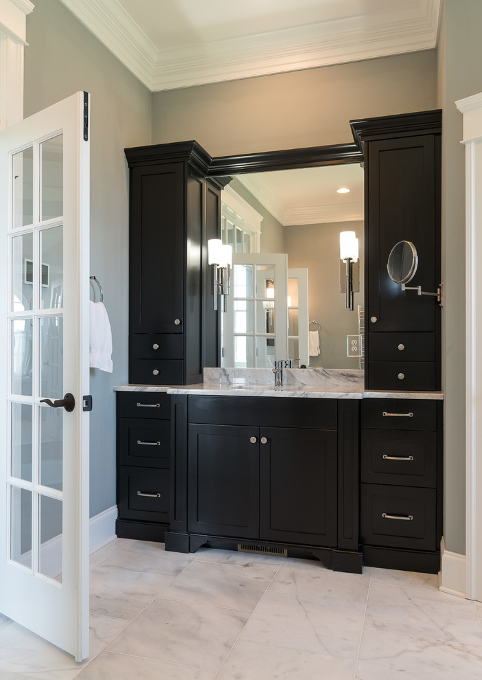 Inspiration for a large contemporary master gray tile and porcelain tile marble floor and white floor bathroom remodel in Other with shaker cabinets, black cabinets, a one-piece toilet, green walls, an undermount sink, marble countertops and a hinged shower door