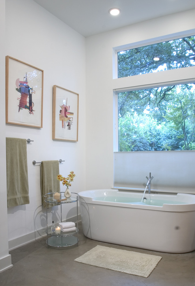 Photo of a contemporary bathroom in Austin with a freestanding bath.