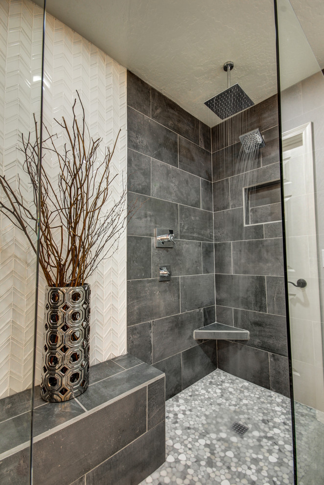 Doorless shower - large contemporary master gray tile and cement tile porcelain tile doorless shower idea in Phoenix with shaker cabinets, white cabinets, gray walls, an undermount sink and quartzite countertops