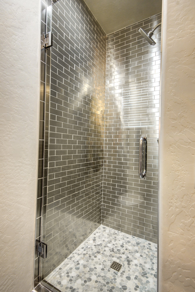 Small contemporary shower room bathroom in Phoenix with shaker cabinets, a walk-in shower, a two-piece toilet, grey tiles, metal tiles, grey walls, porcelain flooring, a vessel sink and quartz worktops.